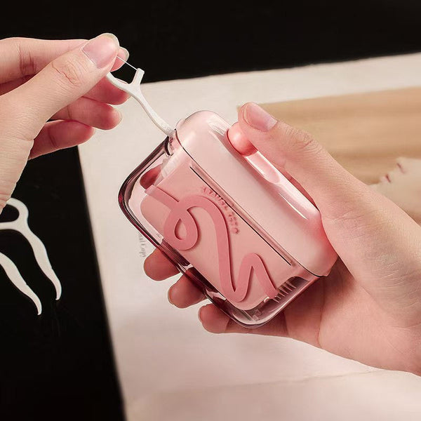 Travel-sized storage case - features an automatic pop-up dispenser, portable and refillable